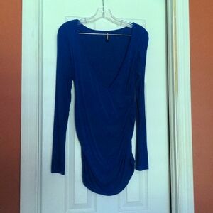 Top. Lightweight and comfy. Long sleeves low cut in front.